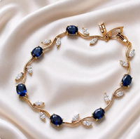 Luminous gold-plated crystal tulip bracelet with floral design