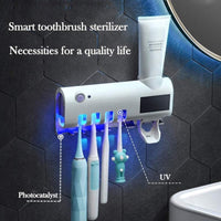 UV light toothbrush holder and dispenser
